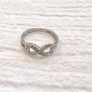 3/$15 Dainty, stackable silver infinity ring with cubic zirconia- size 6